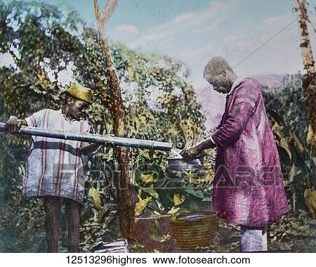 Stock Photograph - Magic Lantern slide circa 1900 hand coloured. A slide entitled the milk man showing milk being dispensed possibly Madagascar for Africa. Fotosearch