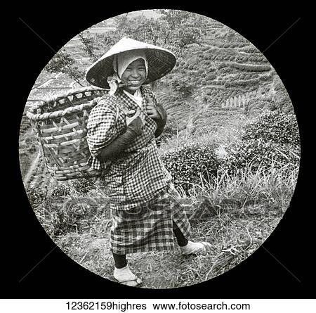 Stock Photograph - Magic lantern slide circa 1900. Victorian, A native girl with basket on her back, country unknown. Fotosearch