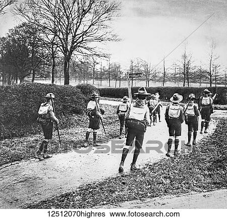 Magic lantern slide circa 1900. Victorian. Social History. Boy scouts trekking along a path View Large Photo Image Stock Photograph - Magic lantern slide circa 1900. Victorian. Social History. Boy scouts trekking along a path. Fotosearch