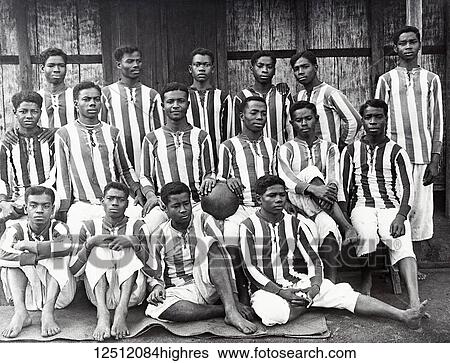 Stock Photograph - Magic lantern slide circa 1900. Victorian. Social History. Society for the propagation of the gospel in foreign parts. Missionary work in Madagascar off the coast of Africa. Madagascar, madgasy football team 1914. Fotosearch