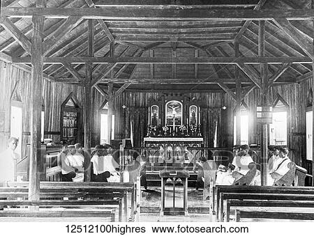 Stock Photograph - Magic lantern slide circa 1900. Victorian. Social History. Society for the propagation of the gospel in foreign parts. Missionary work in Madagascar off the coast of Africa. Local church with choir possibly Mahanaro. Fotosearch