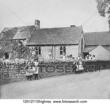 Magic lantern slide circa 1900. Victorian. Victorian children outside the school and in the lane. Uffington school referred to in Tom Browns School days. View Large Photo Image Stock Photograph - Magic lantern slide circa 1900. Victorian. Victorian children outside the school and in the lane. Uffington school referred to in Tom Browns School days.. Fotosearch