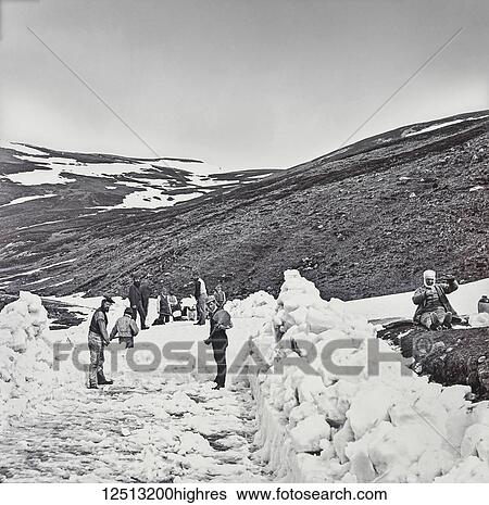 Magic lantern slide circa 1900. Victorian. Social History. Clearing the snow in the Scottish hills. A little bit of humour as a man sitting on the edge of the frame drinks whisky View Large Photo Image Stock Photograph - Magic lantern slide circa 1900. Victorian. Social History. Clearing the snow in the Scottish hills. A little bit of humour as a man sitting on the edge of the frame drinks whisky. Fotosearch