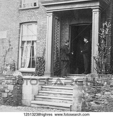 Magic lantern slide circa 1900. Victorian. Social History. Image from a slide presentation entitled In His step or In jesus Name. Vicar and poor man at the vicarage door of a victorian house View Large Photo Image Stock Photograph - Magic lantern slide circa 1900. Victorian. Social History. Image from a slide presentation entitled In His step or In jesus Name. Vicar and poor man at the vicarage door of a victorian house. Fotosearch