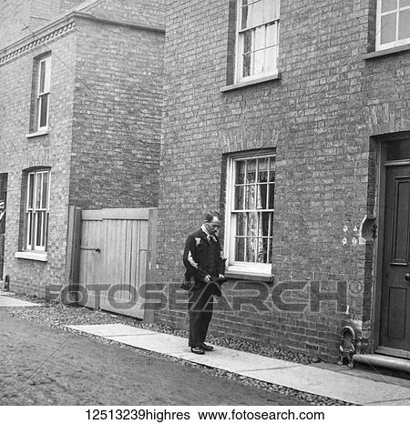 Magic lantern slide circa 1900. Victorian. Social History. Image from a slide presentation entitled In His step or In jesus Name. tramp walking the streets. Unemployed person with no money View Large Photo Image Stock Photograph - Magic lantern slide circa 1900. Victorian. Social History. Image from a slide presentation entitled In His step or In jesus Name. tramp walking the streets. Unemployed person with no money. Fotosearch