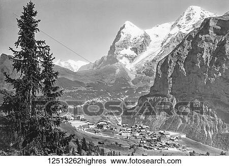 Magic lantern slide circa 1900. Victorian. The view to Mrren a traditional Walser mountain village in Bernese Oberland, Switzerland, at an elevation of 1, 638m (5, 374 ft. ) above sea level and unreachable by public road. Tourism is popular through the... View Large Photo Image Stock Photograph - Magic lantern slide circa 1900. Victorian. The view to Mrren a traditional Walser mountain village in Bernese Oberland, Switzerland, at an elevation of 1, 638m (5, 374 ft. ) above sea level and unreachable by public road. Tourism is popular through the.... Fotosearch