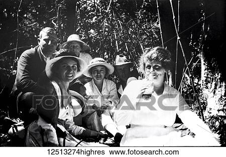 Stock Photograph - Magic lantern slide circa 1900. Victorian/Edwardian social history. A picnic in Endeavour Bay New Zealand. Fotosearch