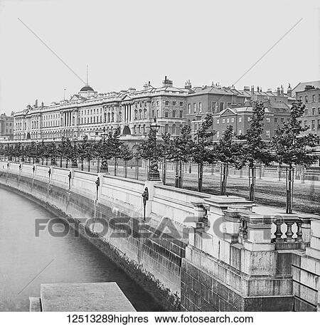 Stock Photograph - Magic lantern slide circa 1900. Victorian. Social History. Somerset House is a large Neoclassical building situated on the south side of the Strand in central London, overlooking the River Thames, just east of Waterloo Bridge. The building, originally.... Fotosearch