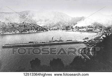 Magic lantern slide circa 1900. Victorian/Edwardian social history. Picton Harbour and Pier, New Zealand. Picton (M? ori: Waitohi) is a town in the Marlborough Region of New Zealand's South Island. The town is located near the head of the Queen... View Large Photo Image Stock Photograph - Magic lantern slide circa 1900. Victorian/Edwardian social history. Picton Harbour and Pier, New Zealand. Picton (M? ori: Waitohi) is a town in the Marlborough Region of New Zealand's South Island. The town is located near the head of the Queen.... Fotosearch