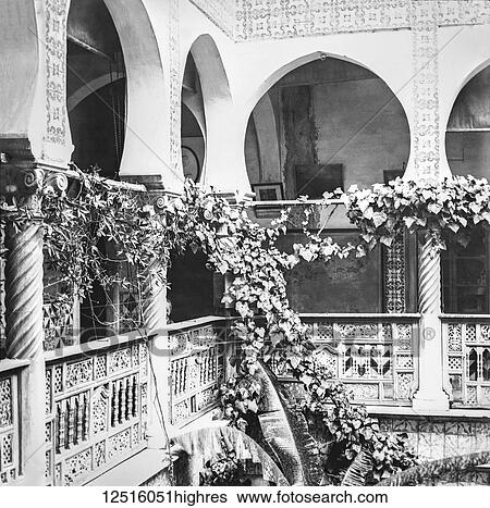 Stock Photograph - Magic lantern slide circa 1900. Victorian/Edwardian. Social History. No. 10. The Museum, First Floor. This, like the Achbishop's Palace, to which it is similar, gives us a good idea of the open and airy manner in which the Orientals build their houses..... Fotosearch