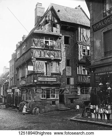 Magic lantern slide circa 1900. Victorian. Social History.. P Labbe, old house in Rue Street St Martin, Bayeux, France. A street scene in france with vases, jugs, shops, children View Large Photo Image Stock Photograph - Magic lantern slide circa 1900. Victorian. Social History.. P Labbe, old house in Rue Street St Martin, Bayeux, France. A street scene in france with vases, jugs, shops, children. Fotosearch