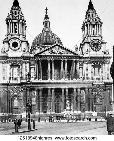 Stock Photograph - Magic lantern slide circa 1900. Victorian/Edwardian. Social History. St Pauls Cathedral around 1900 with people, pram and old road sign. Fotosearch