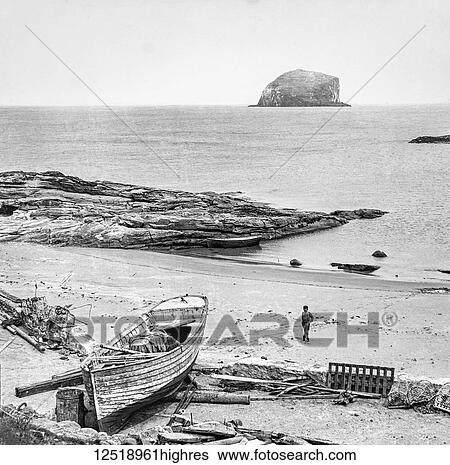 Stock Photograph - Magic lantern slide circa 1900. Victorian/Edwardian. Social History. Canty Bay is a coastal hamlet off the A198, in East Lothian, Scotland, situated opposite the Bass Rock and Tantallon Castle. Settlements nearby include Auldhame, Scoughall, Seacliff,.... Fotosearch