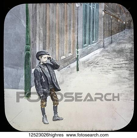 Stock Photograph - Magic lantern slide circa 1900. Victorian/Edwardian. Social History. Mrs Isabel Reaney story of Willie Wills Wings and slide show a christian story. Life model painted background. Slide 25 For many hours he trudged those city streets. Fotosearch
