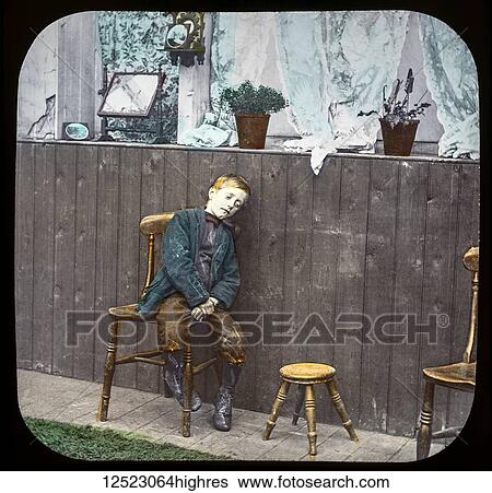Magic lantern slide circa 1900. Victorian/Edwardian. Social History. Mrs Isabel Reaney story of Willie Wills Wings and slide show a christian story. Life model painted background. SLide 15 'Are you feeling quite well to-day Willie? ' poor boy on stool... View Large Photo Image Stock Photograph - Magic lantern slide circa 1900. Victorian/Edwardian. Social History. Mrs Isabel Reaney story of Willie Wills Wings and slide show a christian story. Life model painted background. SLide 15 'Are you feeling quite well to-day Willie? ' poor boy on stool.... Fotosearch