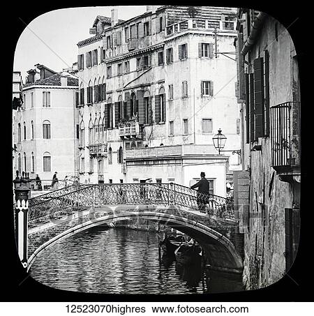 Stock Photograph - Magic lantern slide circa 1900. Victorian/Edwardian. Social History. The Beauties of Venice, photographs created in 1888 Joseph John William ACWORTH F. I. C., F. C. S. J. The Beauties of Venice. may be made by land across the canals by bridges and along.... Fotosearch