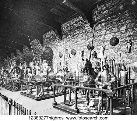 Stock Photograph - Magic Lantern slide circa 1900 views of London, England in Victorian times. Horse armoury, Tower of London. Suits of armourr and horses in museum.. Fotosearch