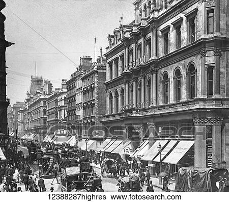 Stock Photograph - Magic Lantern slide circa 1900 views of London, England in Victorian times. Cheapside busy street with horse drawn bus, coaches, shops and people. Fotosearch