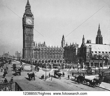 Stock Photograph - Magic Lantern slide circa 1900 views of London, England in Victorian times. The Houses of Parliment looking to Westminster bridge. Horses and carriages with people going to and from work.. Fotosearch