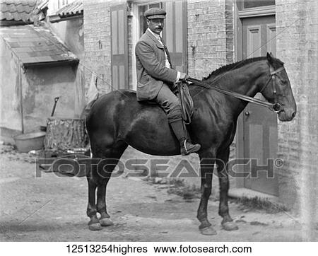Magic lantern slide Glass negative. Man on horse outside terraced house View Large Photo Image Stock Photograph - Magic lantern slide Glass negative. Man on horse outside terraced house. Fotosearch