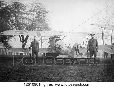 Stock Photograph - Magic lantern slide WW1, 1914-1918, World war one images. British soldiers guarding captured German Fokker aircraft. Display of captured German weapons and artillary at Horse Guards Parade, London 3rd November 1915.. Fotosearch