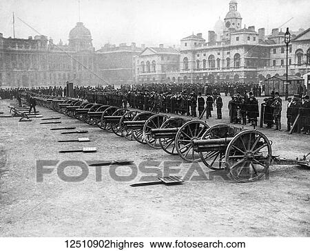 Stock Photograph - Magic lantern slide WW1, 1914-1918, World war one images. October 1915: German field guns captured at the Battle of Loos are displayed in London. Referred to at the time as The Big Push, the Battle of Loos marked the first major example of trench.... Fotosearch
