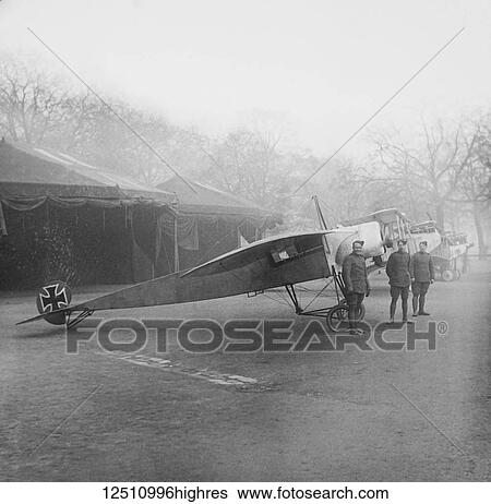 Stock Photograph - Magic lantern slide WW1, 1914-1918, World war one images. Captured German Fokker aircraft with British troops. Display of captured German weapons and artillary at Horse Guards Parade, London 3rd November 1915.. Fotosearch