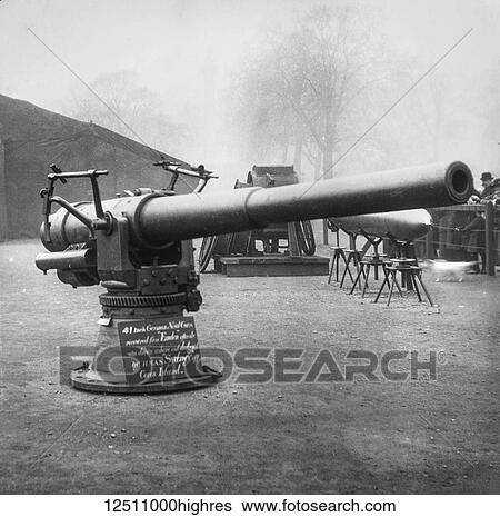 Stock Photograph - Magic lantern slide WW1, 1914-1918, World war one images. A 4. 1 inch German naval gun recovered from the Emden, a German vessel sunk off the Cocos Islands by the HMAS Sydney during World War I. Display of captured German weapons and artillary at.... Fotosearch