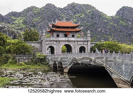 Stock Photograph - Main gateway to the Dinh Tien Hoang Temple; Hoa Lu, Ninh Binh, Vietnam. Fotosearch