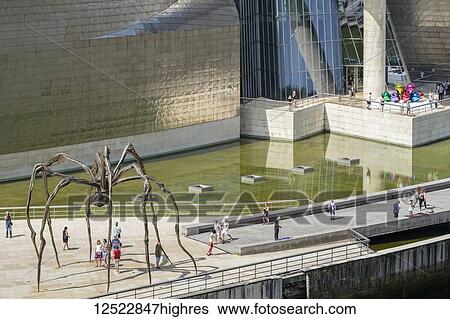 Stock Photograph - 'Maman', a giant spider sculpture by Louise Bourgeois, outside the Guggenheim Museum; Bilbao, Vizcaya, Pais Vasco, Spain. Fotosearch