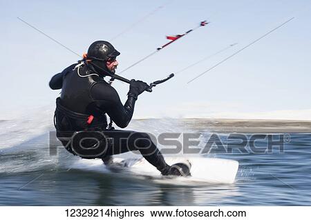 Man kitesurfing near Homer, South-central Alaska; Alaska, United States of America View Large Photo Image Stock Photograph - Man kitesurfing near Homer, South-central Alaska; Alaska, United States of America. Fotosearch
