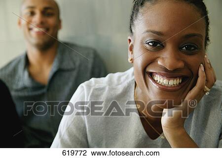 Stock Image - Man looks at woman. Fotosearch