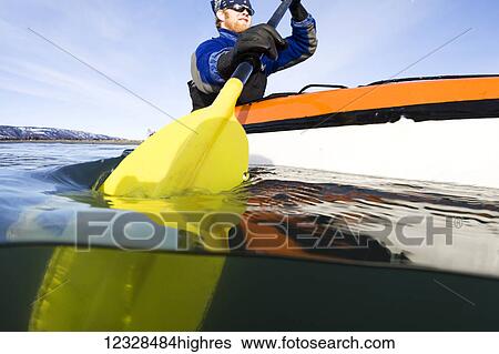 Man sea kayaking in Kachemak Bay, South-central Alaska; Homer, Alaska, United States of America View Large Photo Image Stock Photograph - Man sea kayaking in Kachemak Bay, South-central Alaska; Homer, Alaska, United States of America. Fotosearch