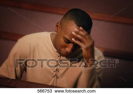 Man sitting in church pew View Large Photo Image Stock Image - Man sitting in church pew. Fotosearch