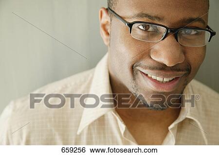 Stock Photograph - Man smiles. Fotosearch