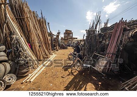 Stock Photograph - Medeber Market, where artisans recycle old tyres and tins to make new artifacts; Asmara, Central Region, Eritrea. Fotosearch
