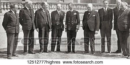 Stock Photograph - Members of the War Cabinet of the All Party Government during WWII, from left to right, Mr. Morrison (Home Office), Lord Woolton (Reconstruction), Sir John Anderson (Exchequer), Mr. Attlee (Deputy Prime Minister), King George VI, Winston Churchill.... Fotosearch