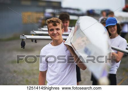 Men's junior quad from the Hanlan Boat Club carrying a boat; Toronto, Ontario, Canada View Large Photo Image Stock Photograph - Men's junior quad from the Hanlan Boat Club carrying a boat; Toronto, Ontario, Canada. Fotosearch