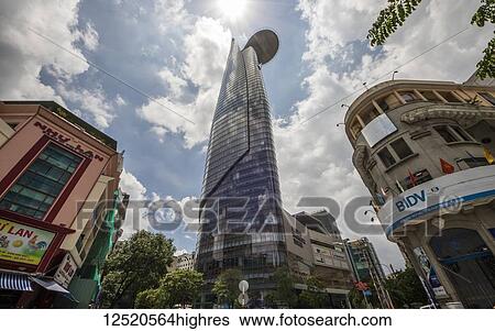 Stock Photograph - Modern skyscraper; Ho Chi Minh City, Vietnam. Fotosearch