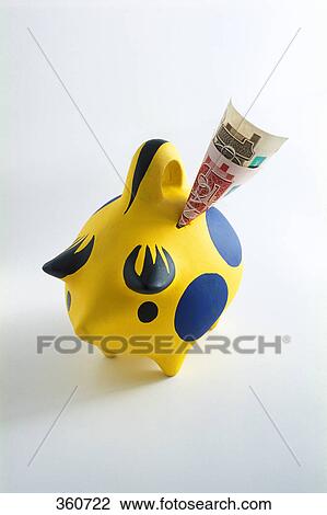 Money in piggy bank View Large Photo Image Stock Image - Money in piggy bank. Fotosearch