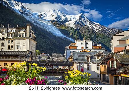 Mont Blanc over Chamonix town and L'Arve River with flowers; Chamonix-Mont-Blanc, Haute-Savoie, France View Large Photo Image Stock Photograph - Mont Blanc over Chamonix town and L'Arve River with flowers; Chamonix-Mont-Blanc, Haute-Savoie, France. Fotosearch