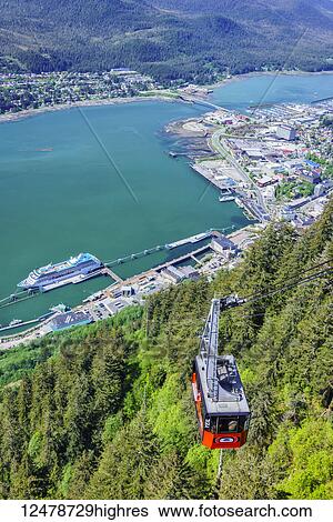 Stock Photograph - Mt. Roberts Tramway transports visitors 1800 meters above Juneau; Juneau, Alaska, United States of America. Fotosearch