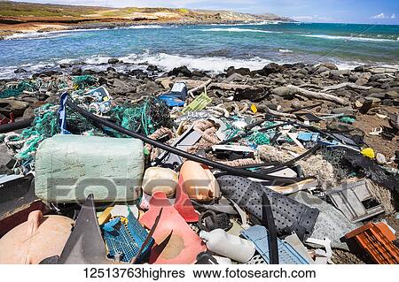 Much of the North side of the island of Molokai is inaccessible. when trade winds blow onshore regularly bringing with them piles of plastic that has been floating around the Pacific Ocean for years and years; Molokai, Hawaii, United States of America View Large Photo Image Stock Photograph - Much of the North side of the island of Molokai is inaccessible. when trade winds blow onshore regularly bringing with them piles of plastic that has been floating around the Pacific Ocean for years and years; Molokai, Hawaii, United States of America. Fotosearch