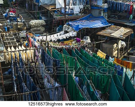 Mumbai boasts the world's largest open air laundromat, Dhobi Ghat; Mumbai, Maharashtra, India View Large Photo Image Stock Photograph - Mumbai boasts the world's largest open air laundromat, Dhobi Ghat; Mumbai, Maharashtra, India. Fotosearch