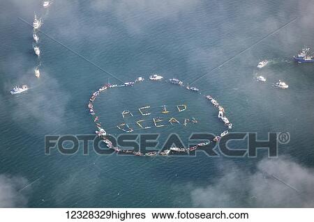 Stock Photograph - Ocean Acidification Demonstration By Boats And Kayaks In Kachemak Bay, Homer, Southcentral Alaska, USA. Fotosearch