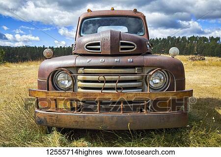 Old rusted pickup truck in field; Colorado, United States of America View Large Photo Image Stock Photograph - Old rusted pickup truck in field; Colorado, United States of America. Fotosearch