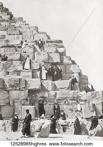 Stock Photograph - One corner of the Great Pyramid of Giza aka the Pyramid of Cheops or Khufu, Giza Plateau, Cairo, Egypt. From The Wonders of the World, published c. 1920.. Fotosearch