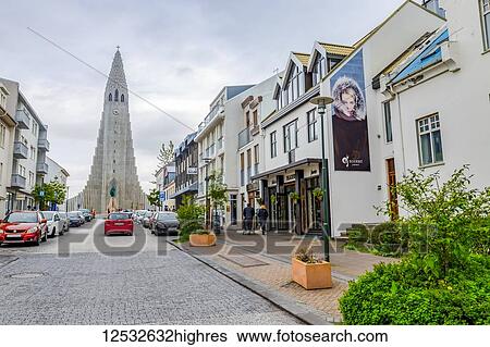 One of the tourist shopping streets in Reykjavik with a view of Hallgrimskirkja church in the distance; Reykjavik, Iceland View Large Photo Image Stock Photograph - One of the tourist shopping streets in Reykjavik with a view of Hallgrimskirkja church in the distance; Reykjavik, Iceland. Fotosearch