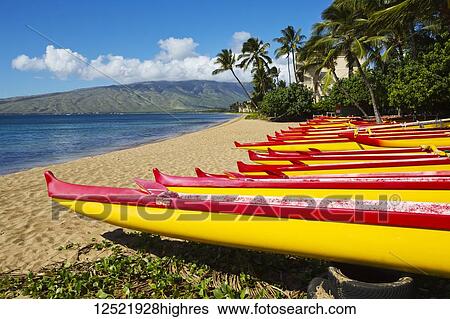 Stock Photograph - Outrigger canoes on the north end of Kihei; Kihei, Maui, Hawaii, United States of America. Fotosearch