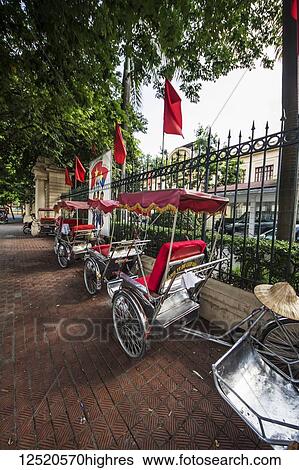 Stock Photograph - Parked cyclos; Hanoi, Vietnam. Fotosearch